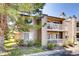 Charming condo featuring two-story deck and stone facade, offering a blend of comfort and style at 10293 E Peakview Ave # F104, Englewood, CO 80111