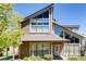 Charming two-story condo with unique architecture, landscaped front yard, and inviting entrance at 10293 E Peakview Ave # F104, Englewood, CO 80111