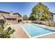 Inviting community pool with ample deck space and lounge chairs at 10293 E Peakview Ave # F104, Englewood, CO 80111
