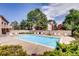 Community pool with lounge chairs for relaxing and enjoying the sun at 10293 E Peakview Ave # F104, Englewood, CO 80111