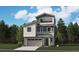Three-story home with a combination of blue siding, white siding, stone accents, and a two-car garage at 9129 White Ridge Rd, Englewood, CO 80112
