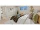 Comfortable bedroom showcases a window, inviting bed arrangement, and calming neutral decor at 63 S Holman Way, Golden, CO 80401