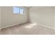 Bright bedroom filled with natural light coming from a window at 63 S Holman Way, Golden, CO 80401
