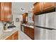 The kitchen features stainless steel appliances and granite countertops at 63 S Holman Way, Golden, CO 80401