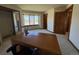 Comfortable bedroom with ample light from the window, closet, and carpeted floors at 2100 Robb St, Lakewood, CO 80215