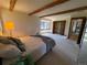Comfortable main bedroom with closet and carpeted floors at 2100 Robb St, Lakewood, CO 80215