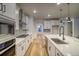 Modern kitchen with stainless steel appliances and white cabinetry at 8512 Orchard City Dr, Littleton, CO 80125