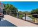 The back deck offers stunning scenic views with seating, perfect for relaxing and enjoying the outdoors at 34827 E 7Th Ave, Watkins, CO 80137