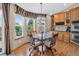 Cozy breakfast nook with natural light and a decorative light fixture, perfect for Gathering meals at 34827 E 7Th Ave, Watkins, CO 80137