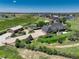 Expansive property featuring well-manicured landscaping, detached garage, and serene acreage views at 34827 E 7Th Ave, Watkins, CO 80137