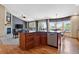 Open-concept kitchen with an island flows into the living room, providing ample space for cooking and entertaining at 34827 E 7Th Ave, Watkins, CO 80137