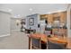Inviting basement living space featuring a kitchenette, dining area, and comfortable seating at 34827 E 7Th Ave, Watkins, CO 80137