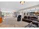 Finished basement with a recreation area, bar, entertainment space and comfortable seating at 34827 E 7Th Ave, Watkins, CO 80137