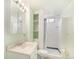 Bathroom featuring vanity, mirror, and a shower with curtain at 4395 E Arapahoe Pl, Centennial, CO 80122