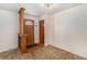 Traditional foyer featuring wooden accents, and a welcoming front door at 4395 E Arapahoe Pl, Centennial, CO 80122