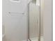 Clean, tiled shower stall featuring a glass door and a bright and minimalist design at 32 Whitehaven Cir, Highlands Ranch, CO 80129