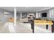 This spacious finished basement has room for entertainment, games, and relaxation at 7611 Copper Sky Ct, Castle Pines, CO 80108