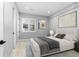 This bedroom is decorated with neutral colors and filled with lots of natural light at 7611 Copper Sky Ct, Castle Pines, CO 80108