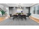 Elegant dining room with a modern chandelier and stylish decor at 7611 Copper Sky Ct, Castle Pines, CO 80108