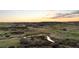 Scenic view of rolling hills and golden sky at sunset at 7611 Copper Sky Ct, Castle Pines, CO 80108