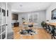 Bright home office with a modern desk, natural light, and stylish decor at 7611 Copper Sky Ct, Castle Pines, CO 80108