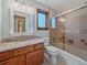 This bathroom features tile flooring, an enclosed shower, and a vanity with sink at 31412 N Bermuda Dunes Dr, Evergreen, CO 80439