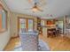Breakfast nook with seating area open to well-appointed kitchen with stainless appliances at 31412 N Bermuda Dunes Dr, Evergreen, CO 80439
