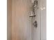 Close up of a standing shower with modern tile and sleek fixtures at 31412 N Bermuda Dunes Dr, Evergreen, CO 80439