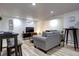Finished basement featuring sleek floors, modern furnishings, and providing a cozy additional living space at 361 N Raleigh St, Denver, CO 80219