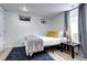 Cozy bedroom with a comfortable bed, modern window, and tasteful decor at 361 N Raleigh St, Denver, CO 80219