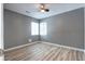 Bright bedroom with sleek floors and well-lit window, perfect for relaxation and comfort at 361 N Raleigh St, Denver, CO 80219