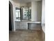 Bathroom with double vanity and tile flooring at 6297 W Prentice Ave, Littleton, CO 80123