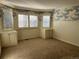 Bedroom with bay window, window seats and shutters at 6297 W Prentice Ave, Littleton, CO 80123