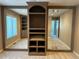 Bright bedroom with mirrored built-ins and window at 6297 W Prentice Ave, Littleton, CO 80123