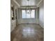 Bright dining room with large window and chandelier at 6297 W Prentice Ave, Littleton, CO 80123