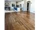 Open floor plan with a large dining area and hardwood floors at 6297 W Prentice Ave, Littleton, CO 80123