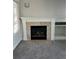 Fireplace with mantel and built-in shelving at 6297 W Prentice Ave, Littleton, CO 80123