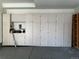 Garage with extensive built-in storage at 6297 W Prentice Ave, Littleton, CO 80123