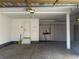 Spacious two-car garage with built-in cabinets and extra storage at 6297 W Prentice Ave, Littleton, CO 80123