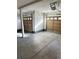 Bright two-car garage with overhead storage at 6297 W Prentice Ave, Littleton, CO 80123
