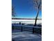 Frozen lake view from backyard in winter at 6297 W Prentice Ave, Littleton, CO 80123