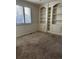 Bright office space with built-in shelving and window shutters at 6297 W Prentice Ave, Littleton, CO 80123