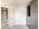 View of a bedroom featuring a built-in murphy bed with shelving and drawers at 3415 Florence Way, Denver, CO 80238
