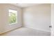 Bright, empty bedroom with natural light, offering a clean and simple space to personalize at 3415 Florence Way, Denver, CO 80238