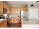 Bright kitchen with stainless steel appliances and plenty of storage space at 3415 Florence Way, Denver, CO 80238