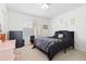 Bright bedroom with a comfortable bed, neutral carpet, and a window, creating a peaceful retreat at 11033 Olathe St, Commerce City, CO 80022