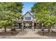 Charming Reunion Coffee House exterior, framed by trees, offering a cozy gathering spot for the community at 11033 Olathe St, Commerce City, CO 80022