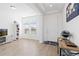 Bright living room boasts hardwood floors, large windows, and neutral walls at 11033 Olathe St, Commerce City, CO 80022