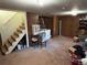 Basement area includes laundry setup and stairs to the upper levels at 1511 Belero St, Broomfield, CO 80020