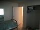 Simple bedroom featuring an open closet storage area and view of hallway at 1511 Belero St, Broomfield, CO 80020